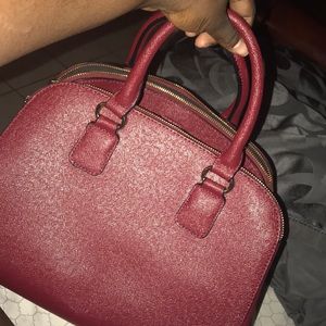 Also Burgundy satchel.